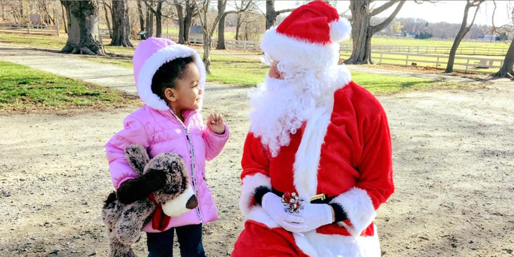 Photo of a little girl and Santa Claus in Austin, Texas